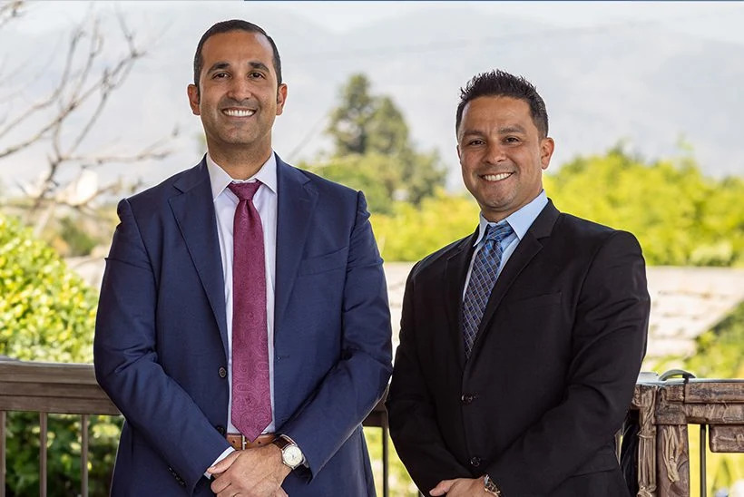 DCD LAW attorneys photographed outdoors
